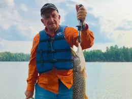 Lloyd Weighing Northern Pike Catch