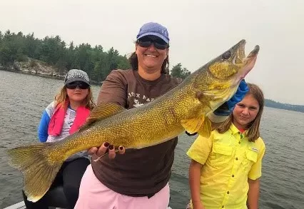 Mother And Daughters With Big Walleye Catch Aspect Ratio 320 220